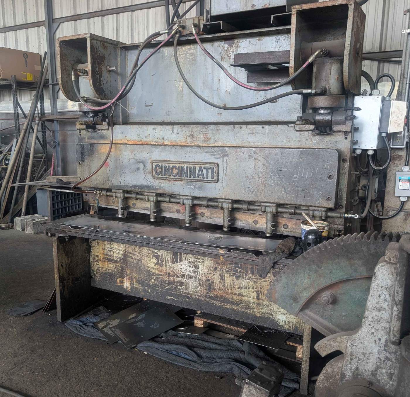 Cincinnati press brake awaiting control modernization, with new hydraulic lines and a Siemens disconnect fitted